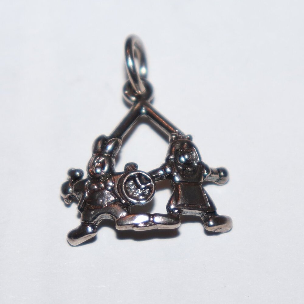 Vintage sterling silver Alice in Wonderland Charm or pendant .75"  .925
